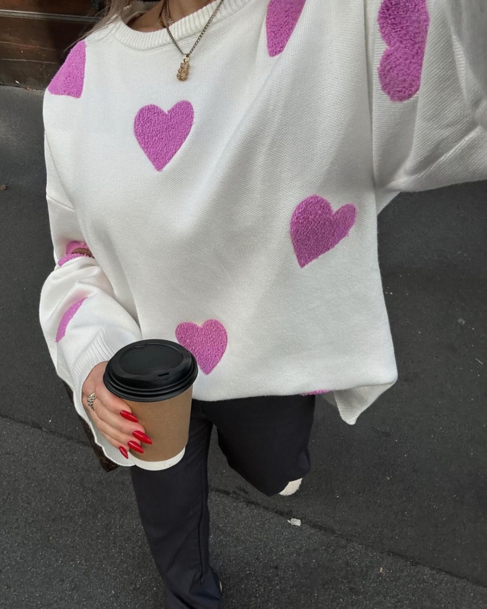 All over heart sweater