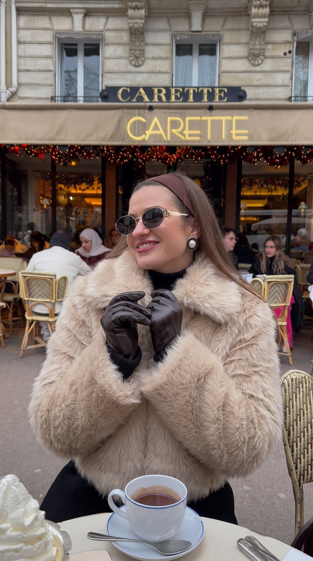 Ferryhill Faux Fur Bomber Jacket at a Paris cafe