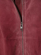 Silver full-length zip detail on marsala bomber jacket