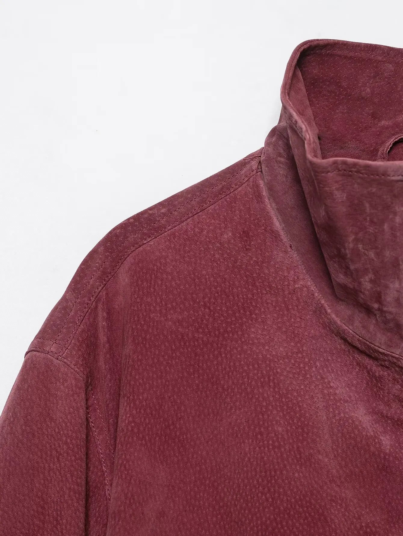 Stand collar and shoulder detail in marsala faux suede