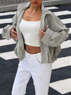 Black gingham funnel-neck jacket worn open
