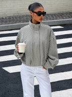 Black gingham funnel-neck jacket, street style