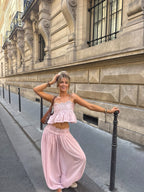 Pink lace cami and wide-leg trouser set, front
