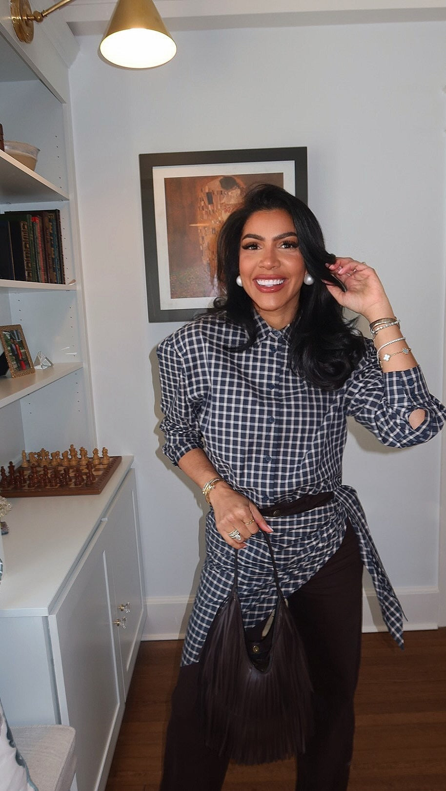 Navy plaid shirt tied at the waist