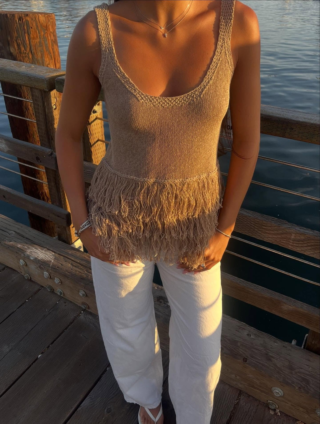 Tassel knit vest top, fringe hem detail