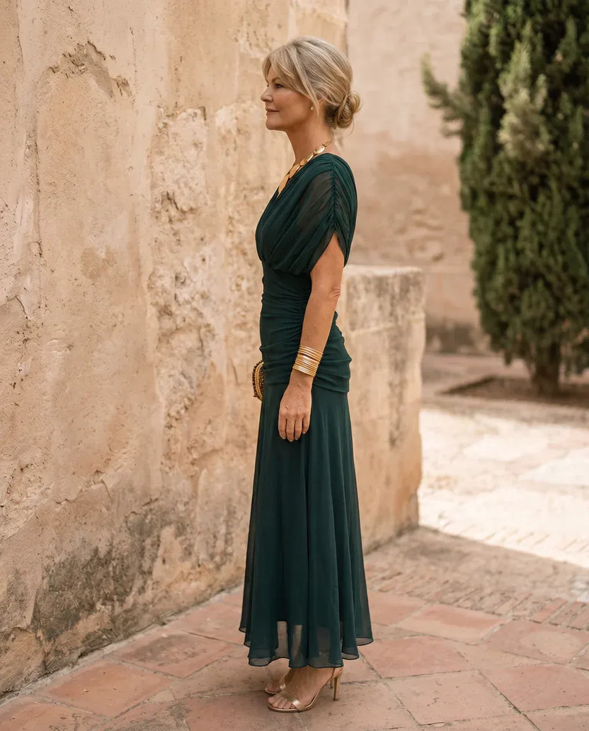 Emerald satin wrap dress for a stunning party look
