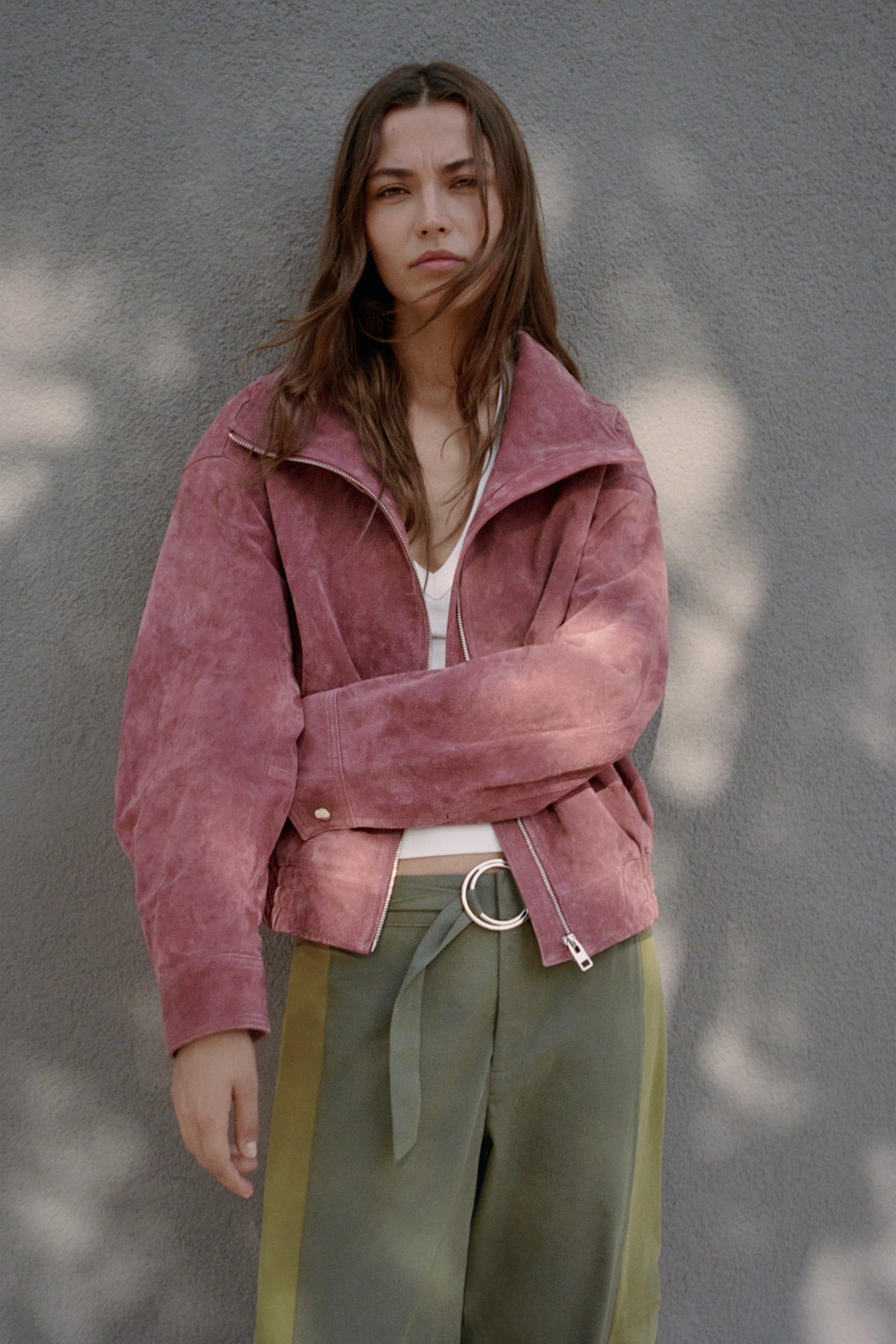 Washed rose suede bomber jacket worn open