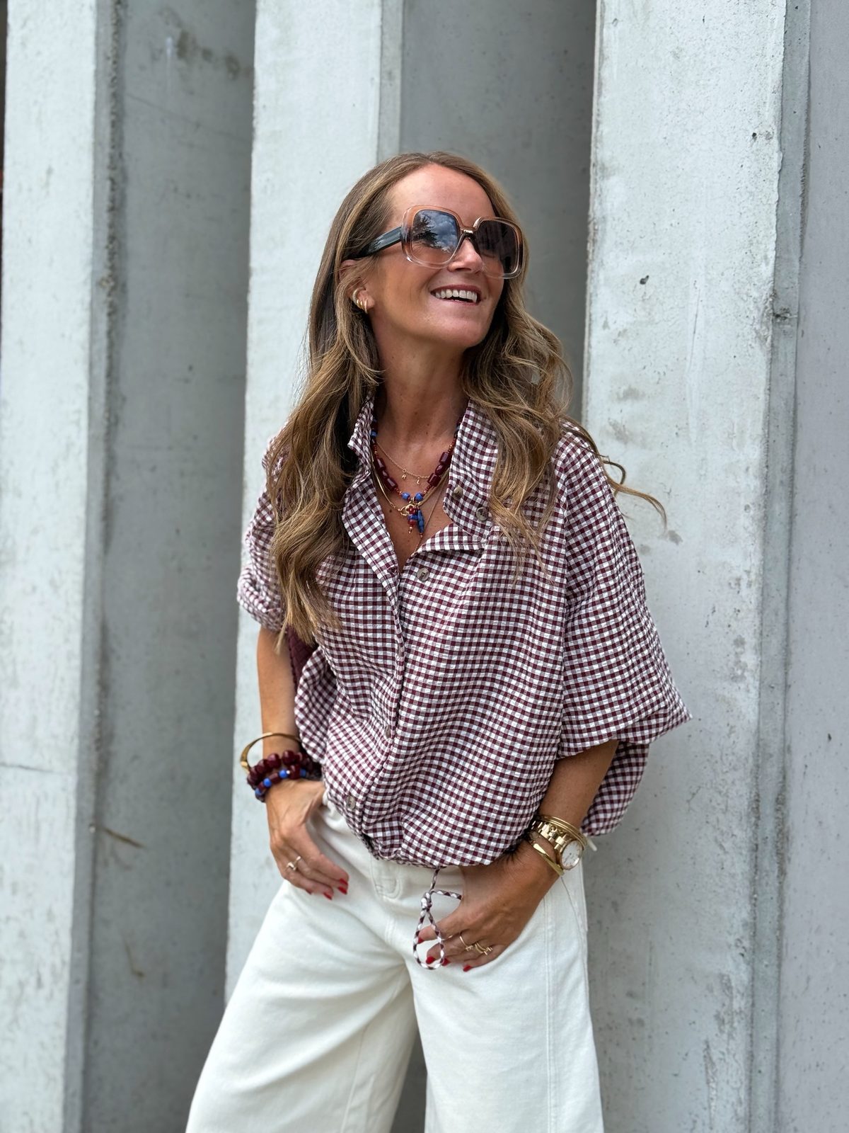 AW26 email — burgundy gingham shirt with white wide-leg jeans