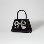 L'amor bow bag in diamante